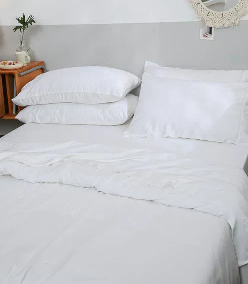Close-up of crisp white sheets on a bed