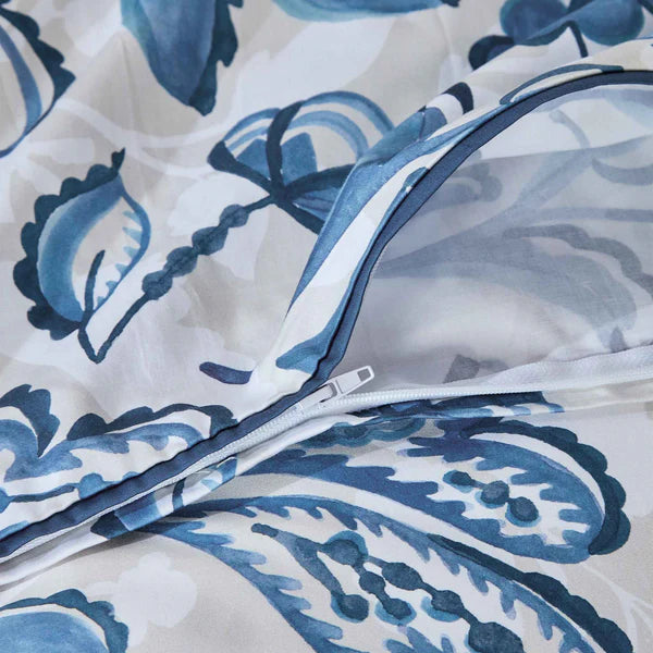 Blue and white patterned fabric of a Canopy Duvet Cover Set with a zipper