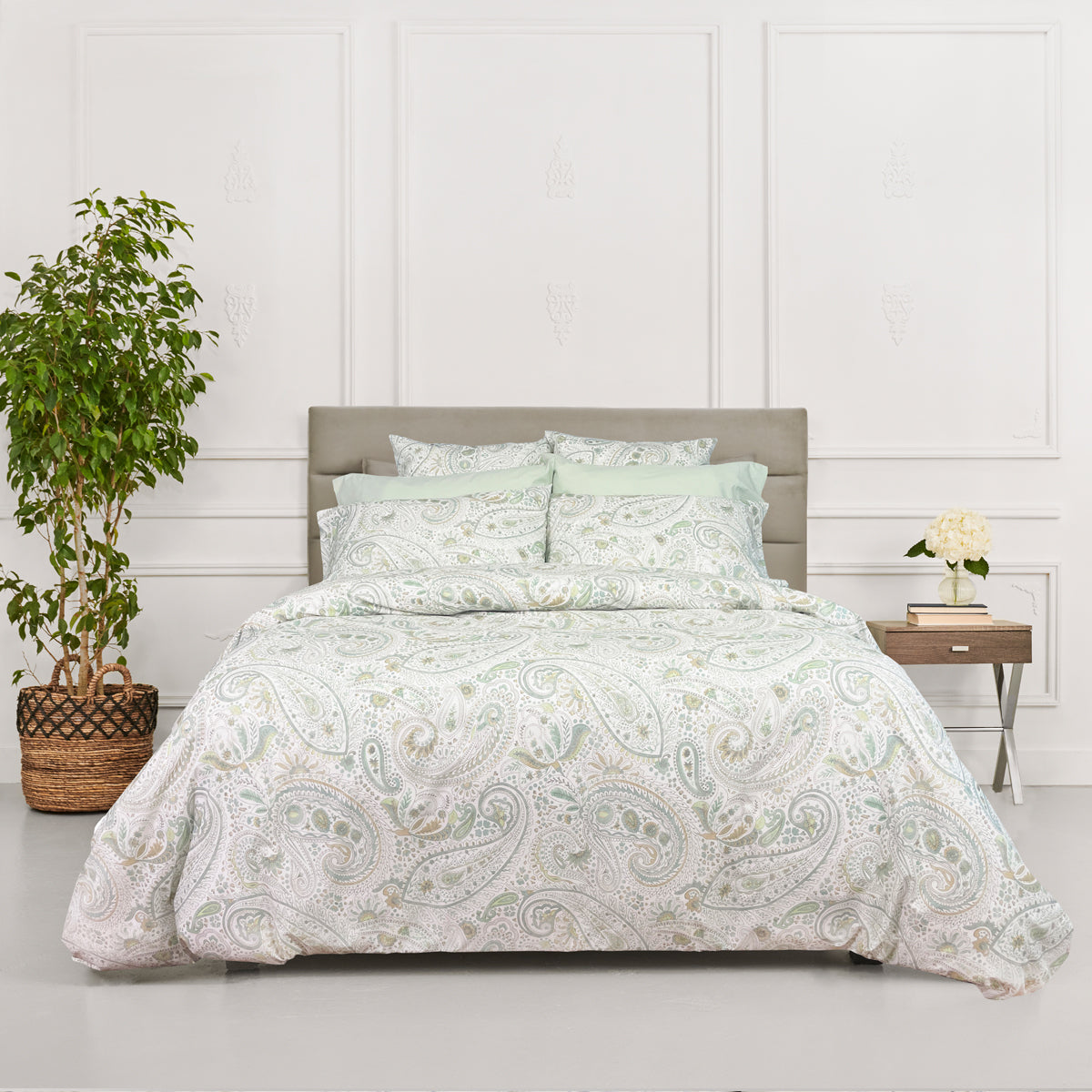 A bed with Annabelle Duvet Cover & Shams in a modern bedroom.