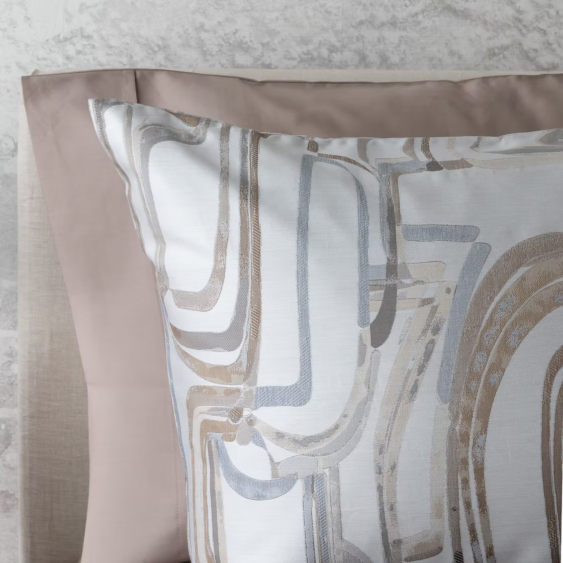 Decorative pillow shamp with abstract Fjord pattern on a neutral background