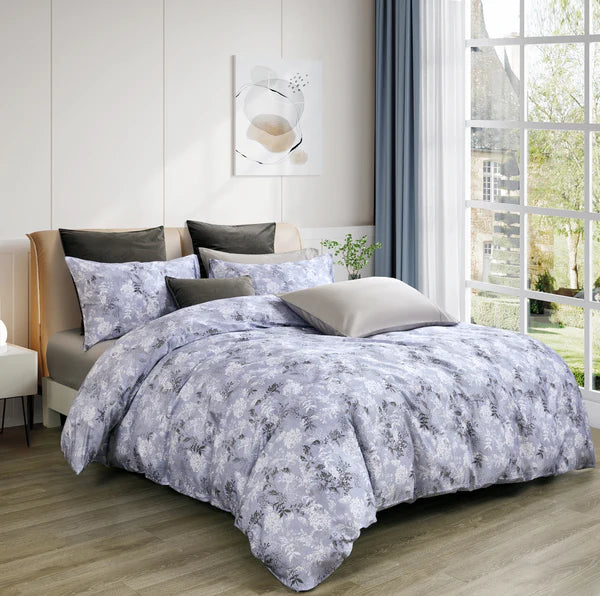 Bedroom with floral Marais Duvet Cover Set and pillows near a window