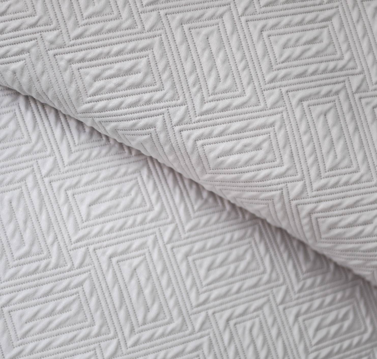 A closeup of a Scala Matelassé - Single Sham Knife Edge by Guildcraft