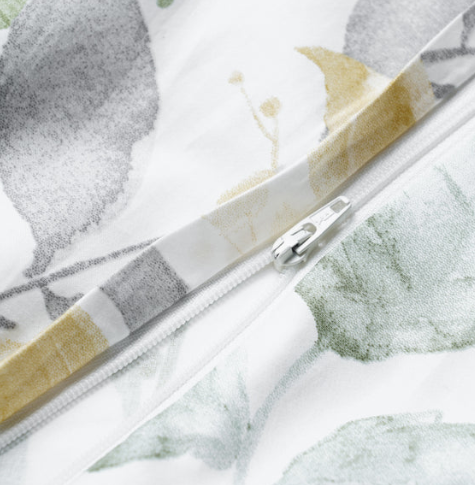 A closeup on a closure of a pillow with Aspen pattern - Guildcraft.