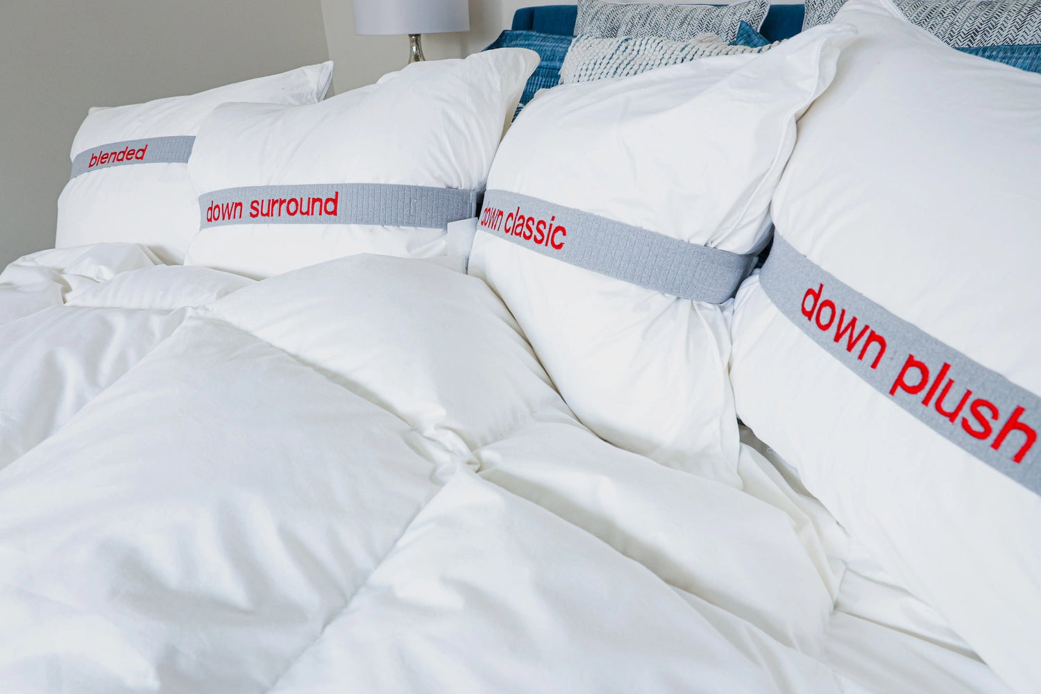 A bed with Guildcraft plush pillows.