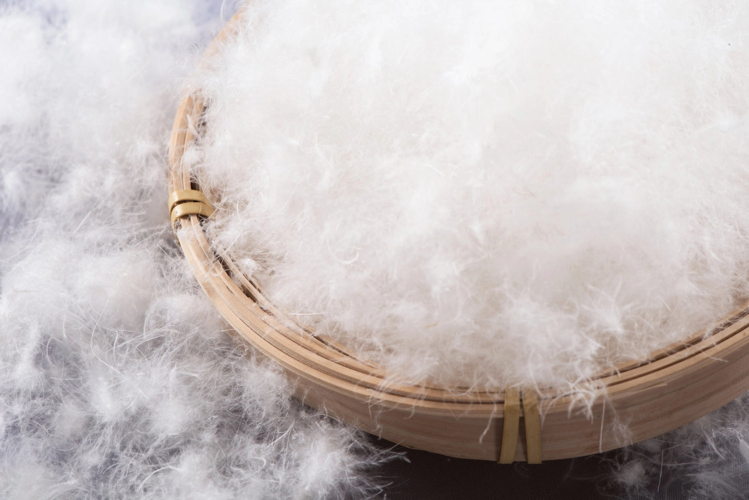 Canadian Hutterite goose down used for duvets shown in a bowl.