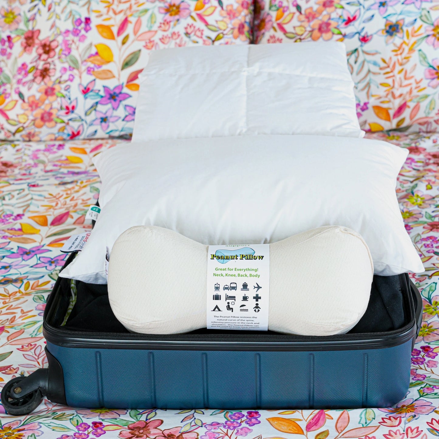 Peanut white pillow in a travel set.