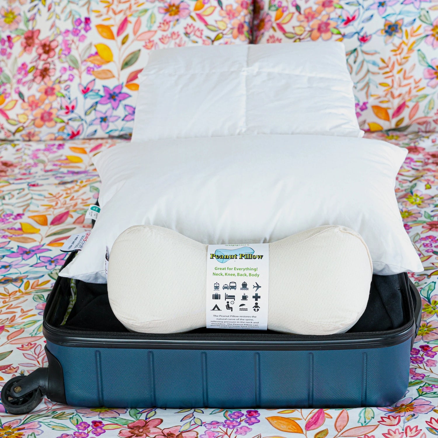 Peanut white pillow in a travel set.