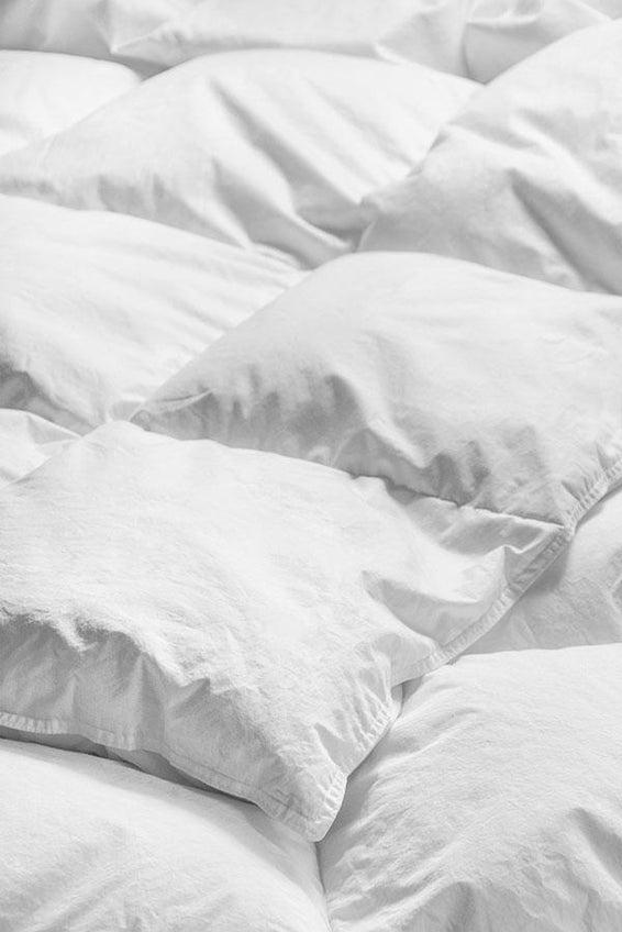 Closeup of a medium weight duvet stitching and a seam.